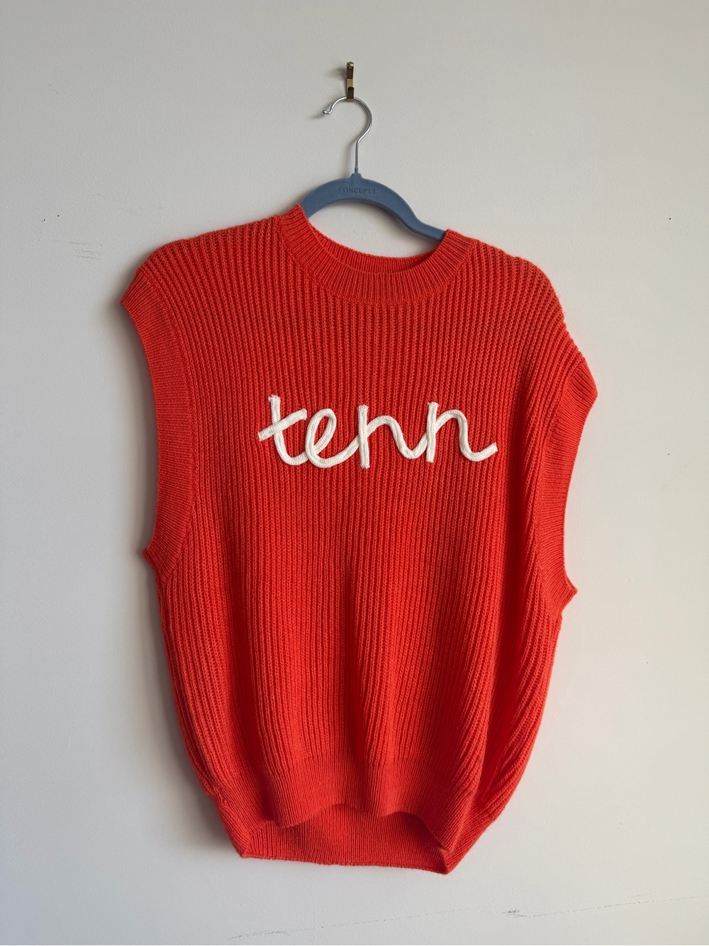 Orange knit “Tenn” sweater
